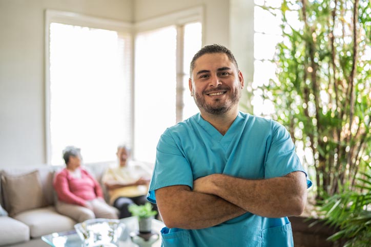 Male nurse in a care home for senior residents