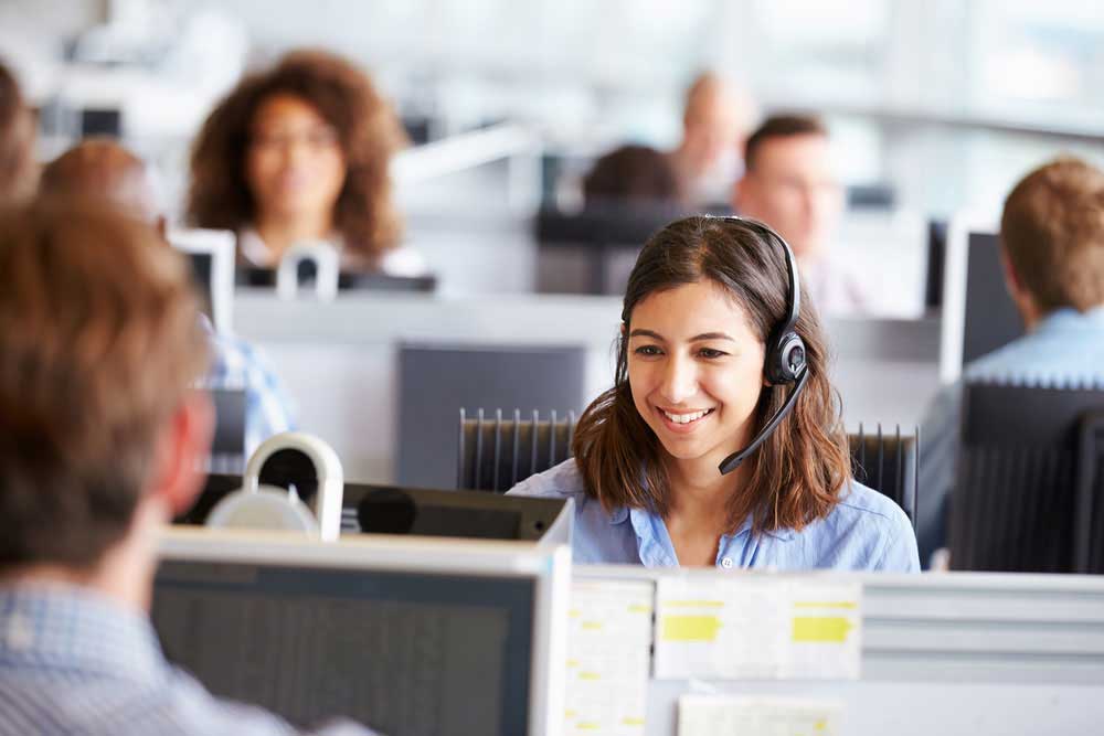 Woman helping customer get a business energy quote